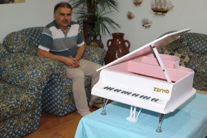  Çöpteki atıklara yeniden hayat veriyor